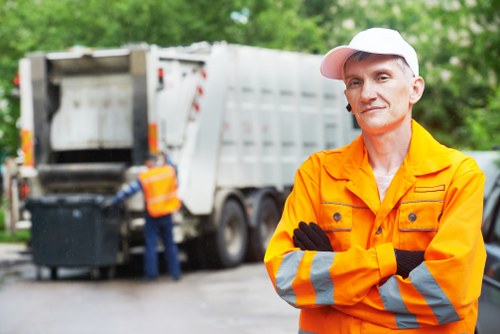 Commercial recycling trucks servicing a local business