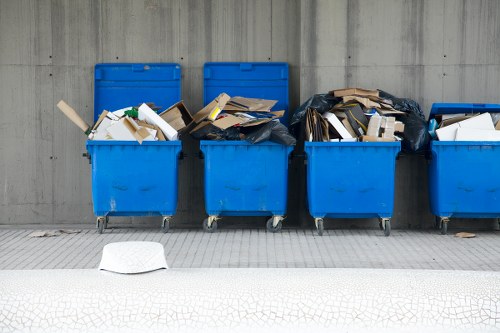 Recycling bins and skips outside a warehouse
