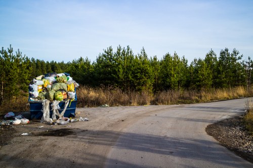 Team member assisting a customer with accessible skip hire arrangements