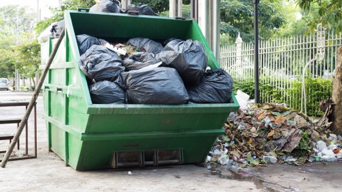 Mini skip being delivered to a residential area in Islington